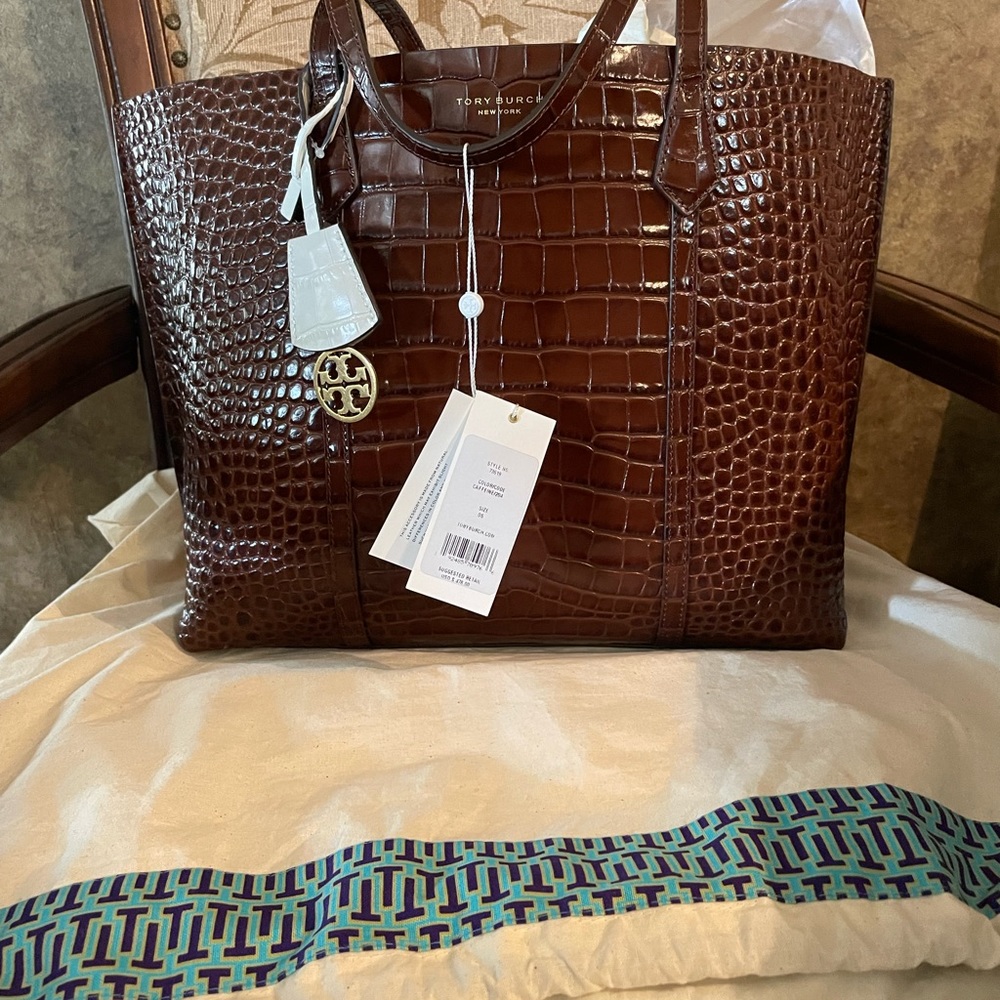 Tory 18 x 11 1/2 x 4 1/2. New with tags